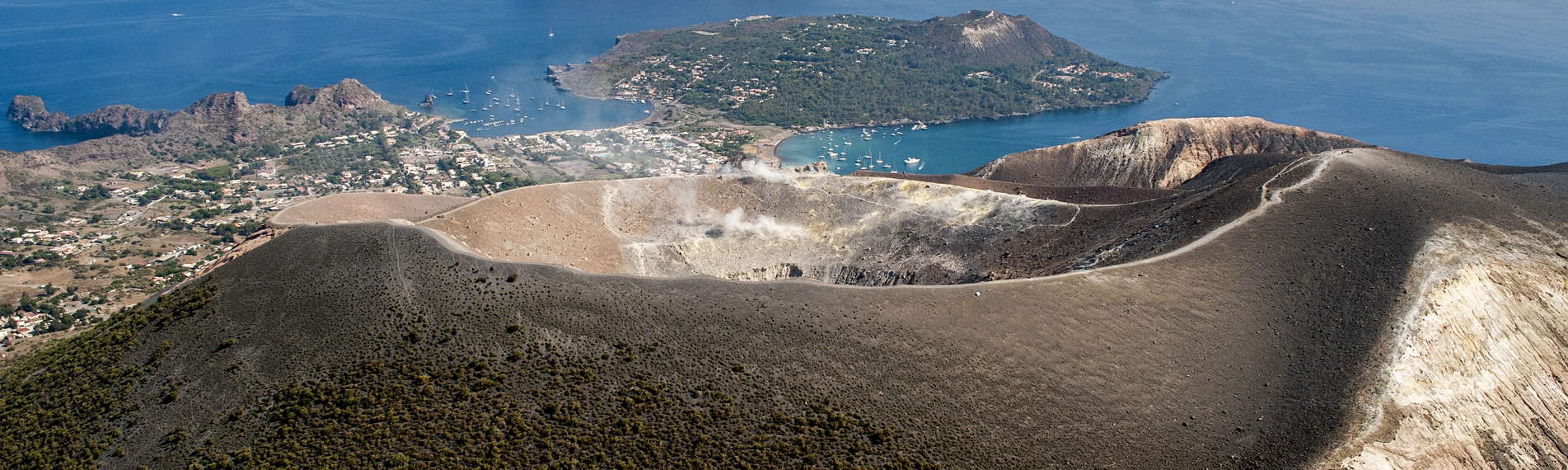 View of the crater and the sea, on ​​Vulcano in the Aeolian Islands, Italy.
